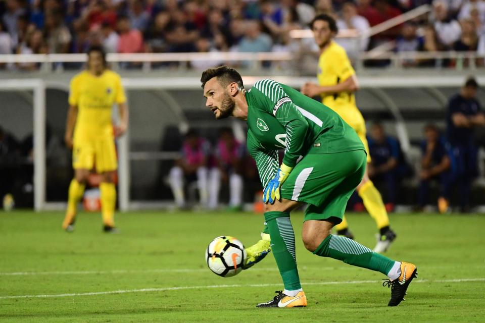 Green fingers: Goalkeeper Hugo Lloris says he trusts his chairman to make the summer signings Spurs need to improve the squad: Icon Sport via Getty Images