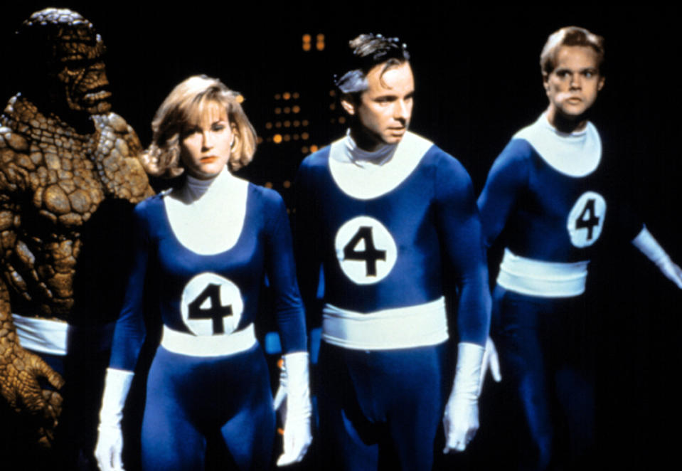 Alex Hyde-White as Reed Richards, Rebecca Staab as Susan Storm, Jay Underwood as Johnny Storm and Carl Ciarfalio as Thing in Roger Corman’s 1994 unreleased ‘The Fantastic Four.’ - Credit: Everett Collection