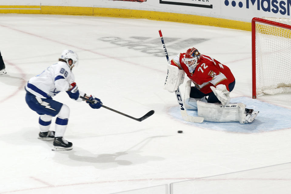 Florida Panthers goaltender Sergei Bobrovsky (72) stops a breakaway shot by Tampa Bay Lightning right wing Nikita Kucherov (86) during the first period in Game 1 of an NHL hockey Stanley Cup first-round playoff series, Sunday, May 16, 2021, in Sunrise, Fla. (AP Photo/Joel Auerbach)