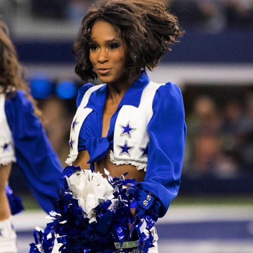 Jacie Scott cheering for the Dallas Cowboys