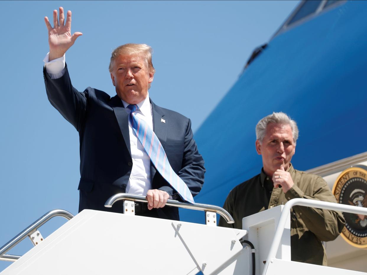 Former US president Donald Trump and House Republican leader Kevin McCarthy together in 2019 (REUTERS)