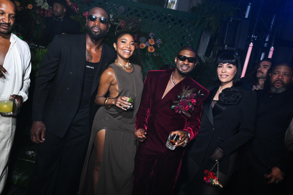 Dwyane Wade, Gabrielle Union, Usher and Jennifer Goicoechea at Usher's Secret Garden Met Gala After Party held at The Times Square Edition