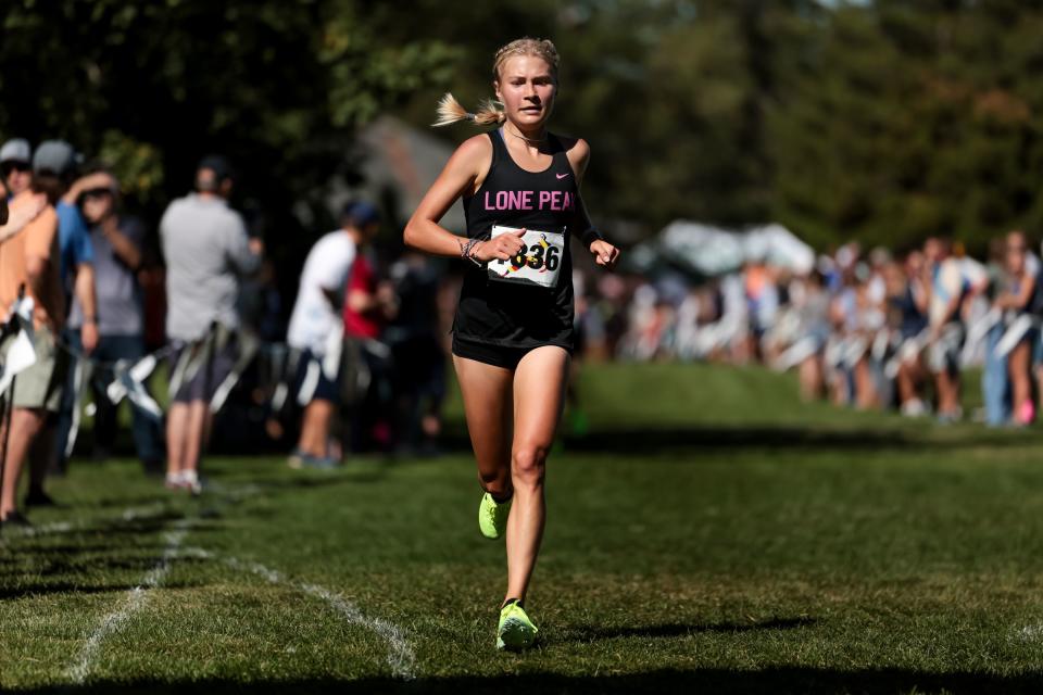 Andie Aagard of Lone Peak places first in the championship girls race at the Border Wars XC meet at Sugar House Park in Salt Lake City on Saturday, Sept. 16, 2023. | Spenser Heaps, Deseret News