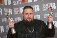 Rory Graham lead singer of British band Rag'n'Bone poses with his award for Best British Breakthrough Act at the Brit Awards at the O2 Arena in London, Britain, February 22, 2017. REUTERS/Neil Hall