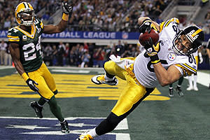 Hines Ward's eight-yard touchdown reception just before halftime cut the Packers' lead to 21-10