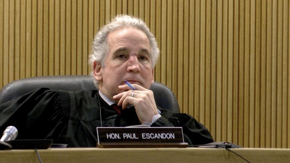 Superior Court Judge Paul X. Escandon presides over the detention hearing for Michael Westbrook, charged in the Oceanport murder of Amad Jones, at the Momonouth County Courthouse in Freehold.  The hearing took place via a video link from the Monmouth County Jail Wednesday,  January 18, 2023. 