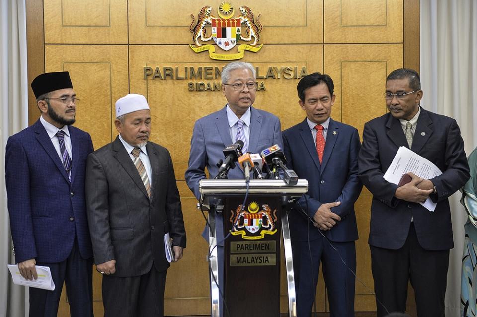 Opposition Leader Datuk Seri Ismail Sabri (centre) speaks in Parliament, and is seen here with other federal Opposition leaders. — Picture by Miera Zulyana