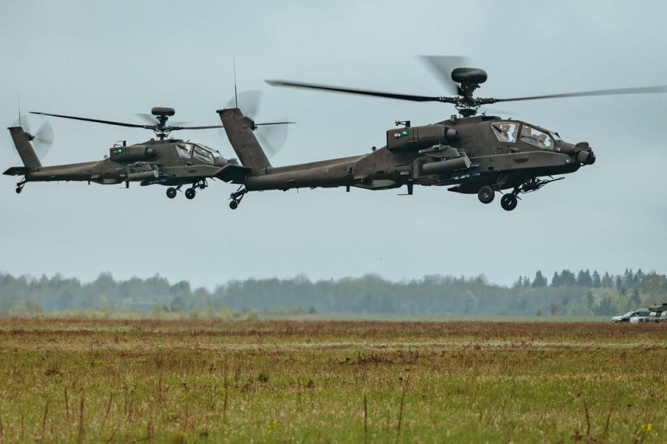 Apache helicopters from the 3rd Regiment of the Army Air Corps support ground troops from the 3rd Battalion, Parachute Infantry Regiment (Cpl Aaron J Stone)