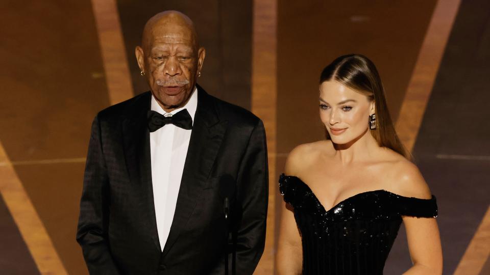 Morgan Freeman on stage with Margot Robbie at the 95th Annual Academy Awards in March 2023