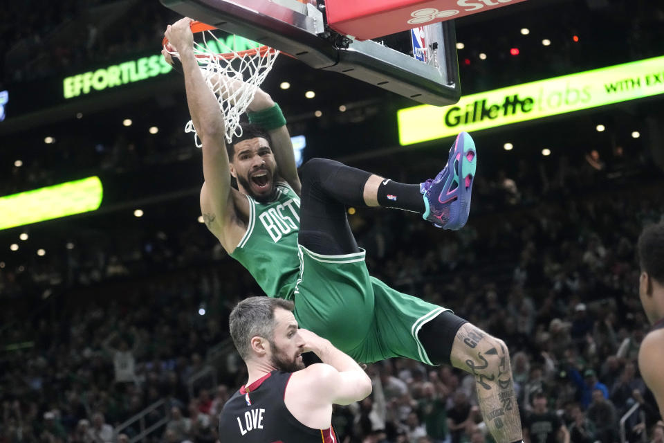 Boston Celtics forward Jayson Tatum dunks during the first half of their victory against the Miami Heat in Game 5 of the NBA's Eastern Conference finals at TD Garden. (AP Photo/Charles Krupa )