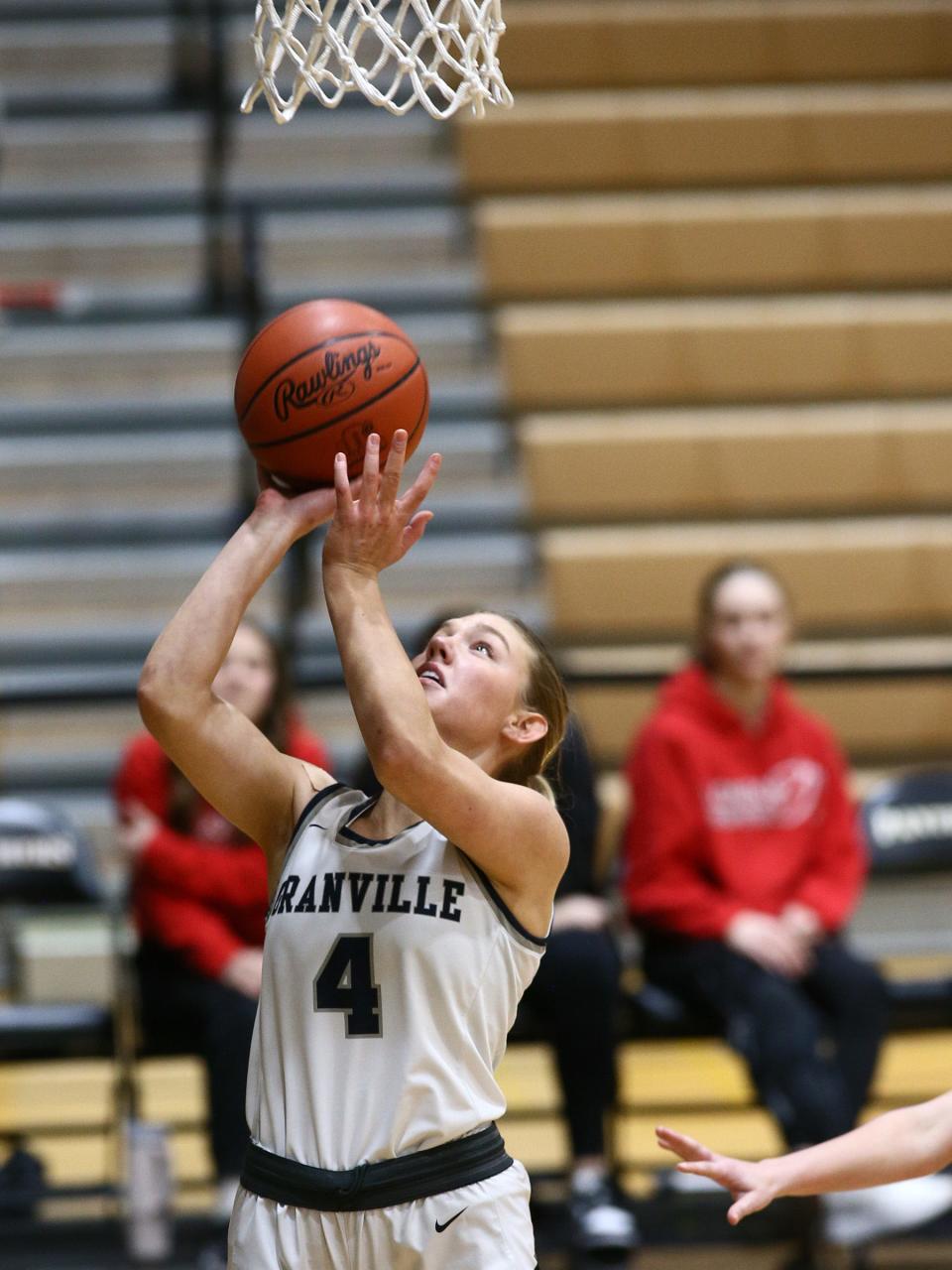 Granville's Taylor Warehime shoots a layup during the Blue Aces' 52-18 victory against London in a Division II district semifinal at Ohio Dominican on Wednesday, Feb. 28, 2024.