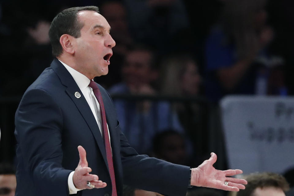 Duke coach Mike Krzyzewski gestures during the first half of the team's NCAA college basketball game against Georgetown in the 2K Empire Classic, Friday, Nov. 22, 2019 in New York. (AP Photo/Kathy Willens)