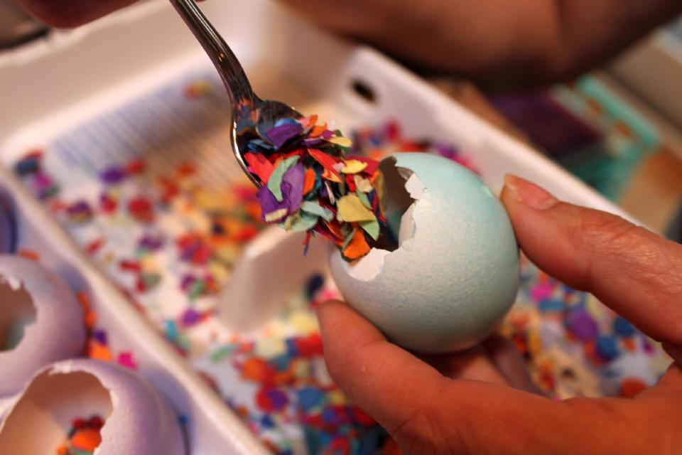 In this March 2012 image released by Cynthia Leonor Garza, a batch of cascarones are being made at the home of Cynthia Leonor Garza in Washington, D.C. Cascarones are hollowed-out eggs that are dyed, decorated and filled with confetti, then covered with a colorful piece of tissue paper. At Easter time, families make or buy cascarones, which is Spanish for "eggshells," for crushing over each other's heads. The tradition came to the United States from Mexico, where cascarones were used during fiestas and other celebrations. In the United States, it has become primarily an Easter tradition. (AP Photo/Cynthia Leonor Garza)