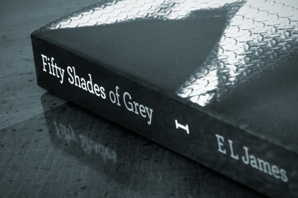 Edmonton, Canada - September 1, 2012: A close-up shot of the erotic novel, "Fifty Shades of Grey." Featuring explicit erotic scenes, this novel has sold 40 million copies worldwide and has set the record of being the fastest-selling paperback of all time.