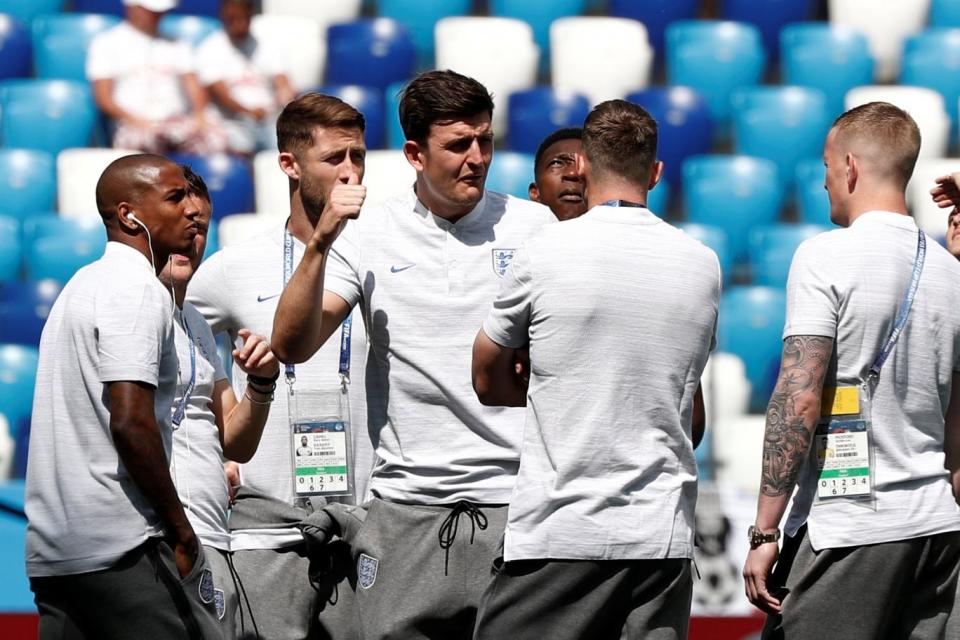 Game on: England players Ashley Young, Gary Cahill, Harry Maguire and Jordan Pickford inside the stadium before the match (REUTERS)