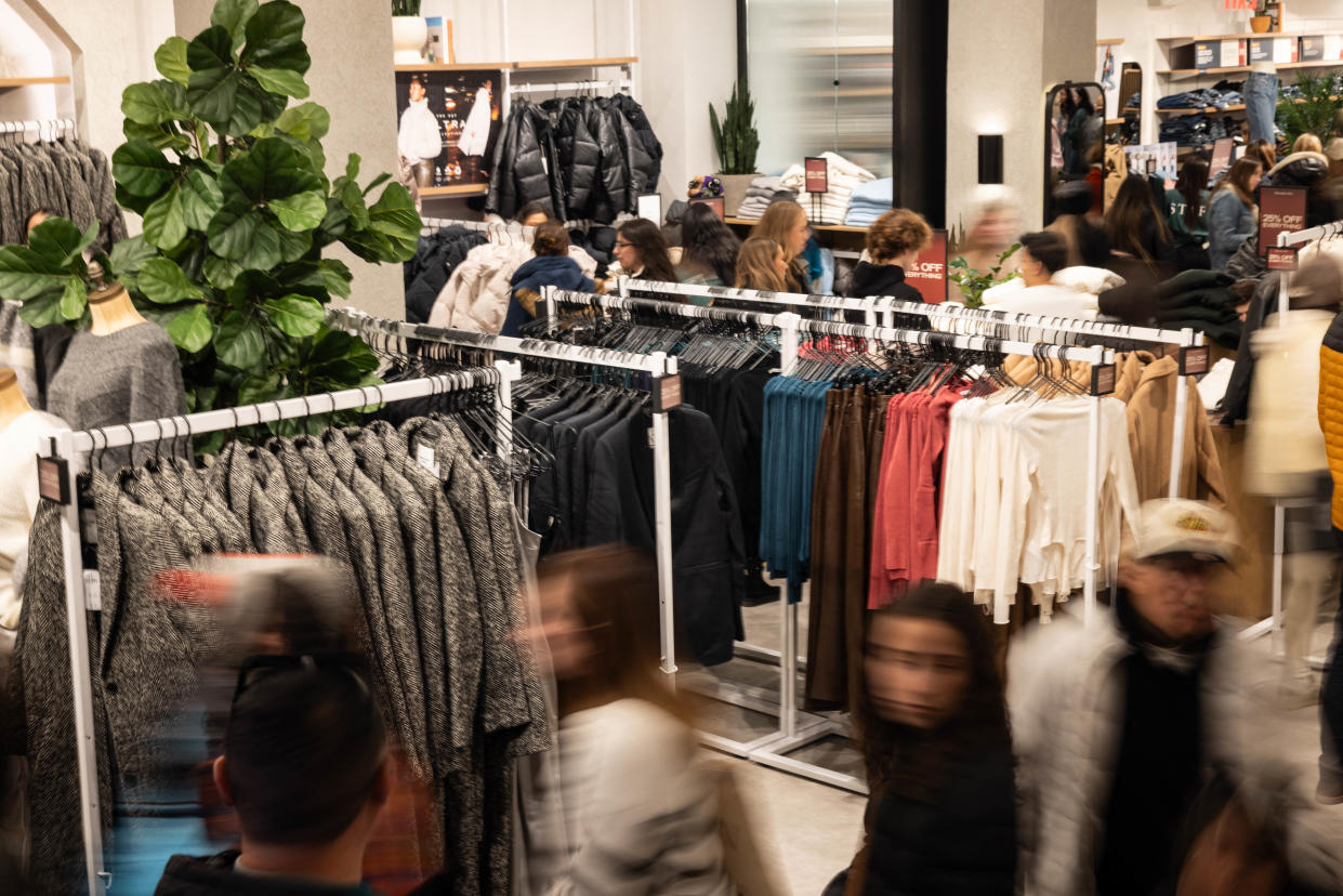 Shoppers are seen at Abercrombie & Fitch store during a Black Friday event in New York, the unofficial start of the holiday shopping season.