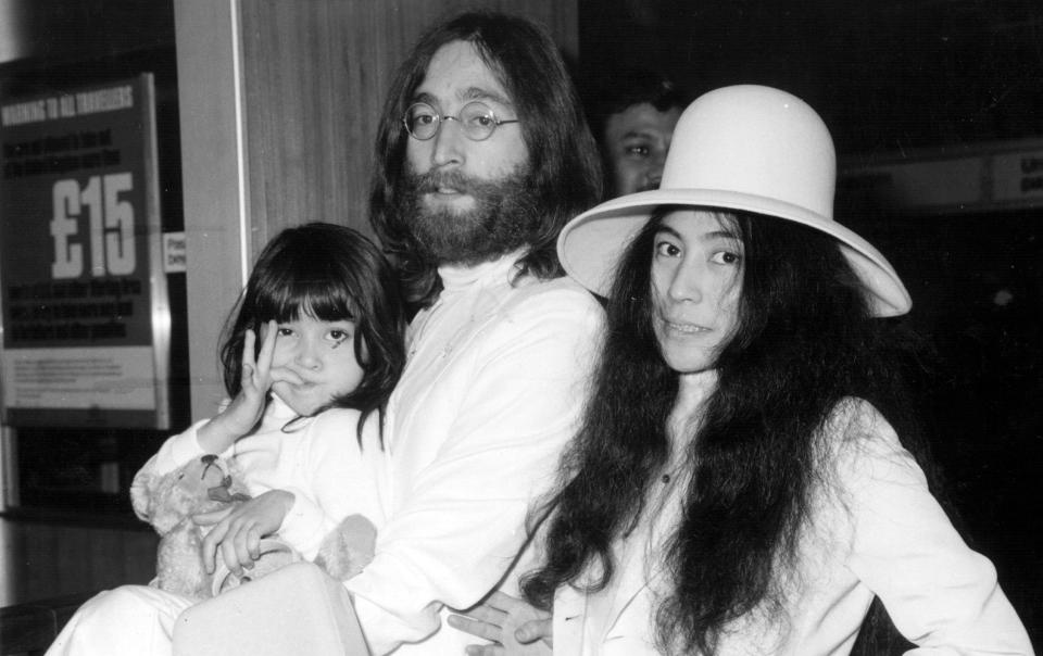 John Lennon with wife Yoko Ono and her daughter Kyoko - Central Press/Getty Images