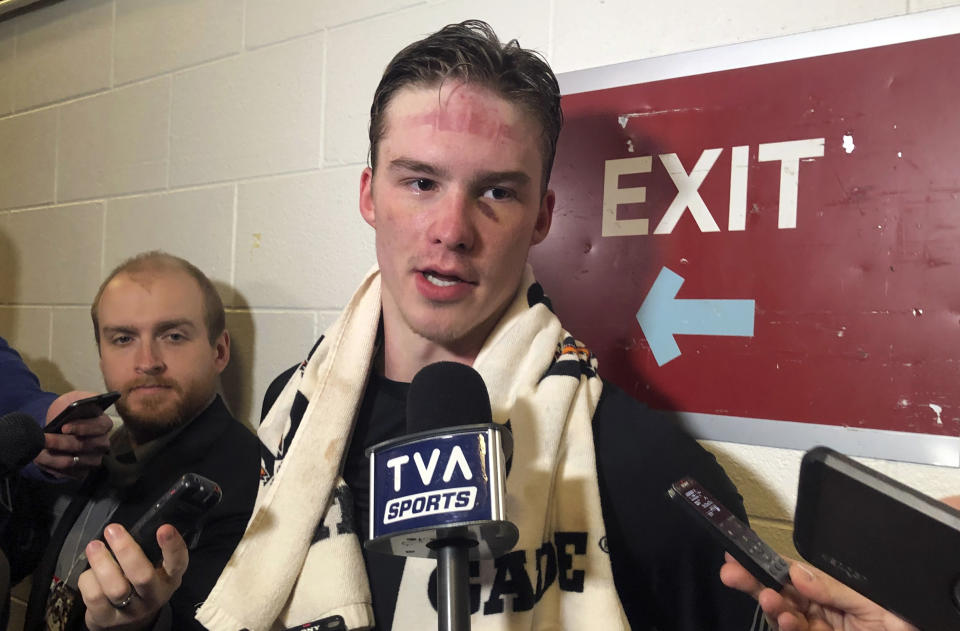 Carolina Hurricanes rookie forward Andrei Svechnikov speaks to reporters after the team’s morning skate in Washington, Saturday, April 20, 2019. Svechnikov suffered a concussion from a fight with Washington Capitals captain Alex Ovechkin in Game 3. (AP Photo/Stephen Whyno)