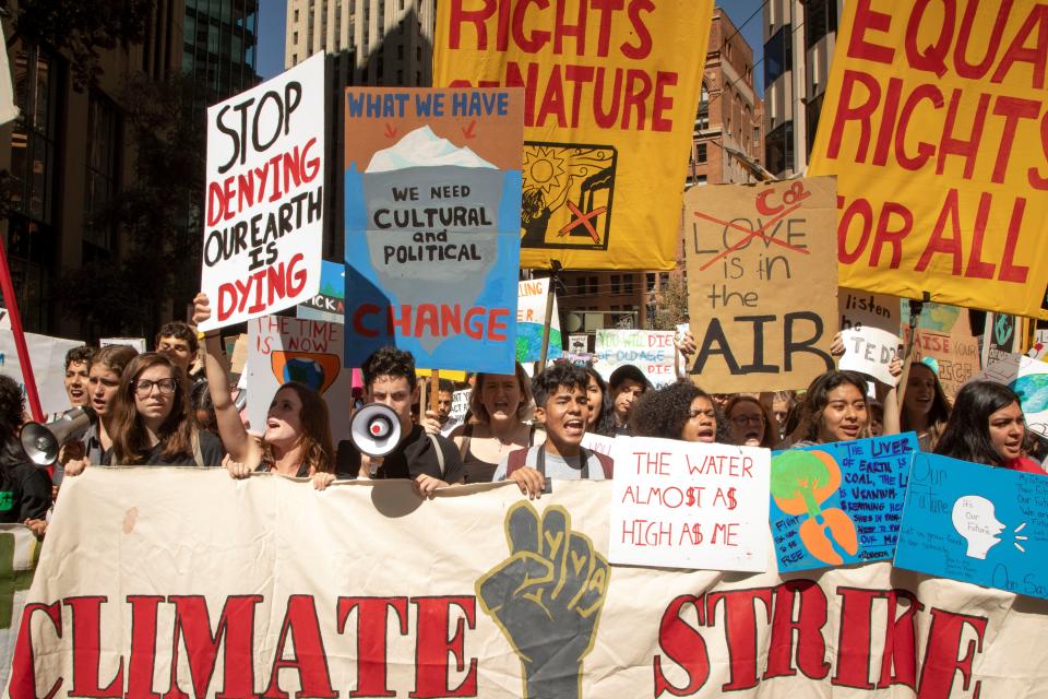 Protesters march in San Francisco, joining hundreds of thousands of protesters around the world at Global Climate Strike rallies on Friday, Sept. 20, 2019.