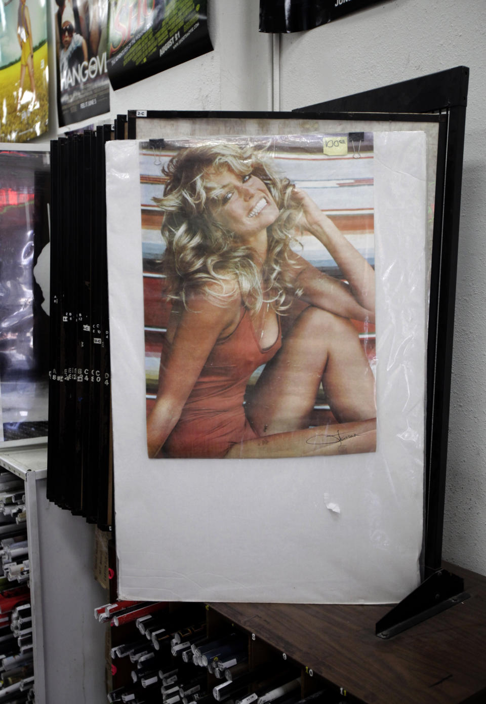 A poster of actress Farrah Fawcett is for sale at Hollywood Book in 2009. (Photo: AP/Jae C. Hong)
