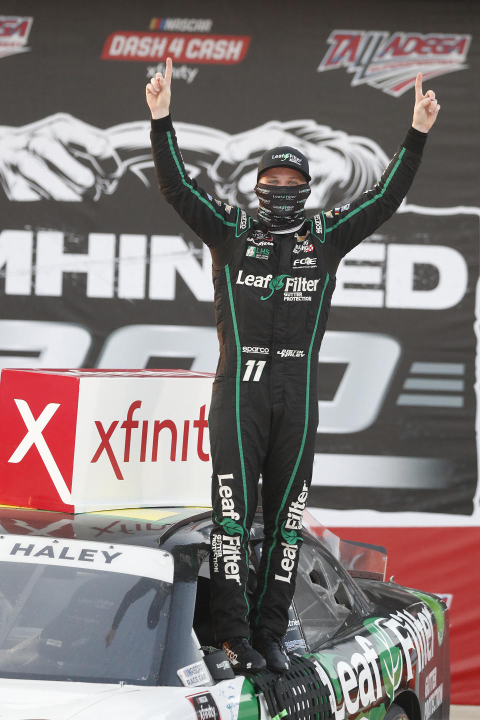 Justin Haley celebrates in Victory Lane after winning a NASCAR Xfinity auto race at Talladega Superspeedway in Talladega Ala., Saturday, June 20, 2020. (AP Photo/John Bazemore)