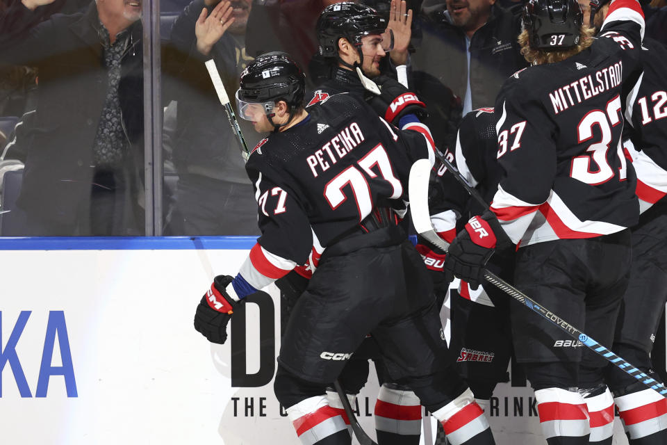 Buffalo Sabres right wing JJ Peterka (77) celebrates his goal against the Los Angles Kings during the first period of an NHL hockey game against the Los Angeles Kings Tuesday, Feb. 13, 2024, in Buffalo, N.Y. (AP Photo/Jeffrey T. Barnes)