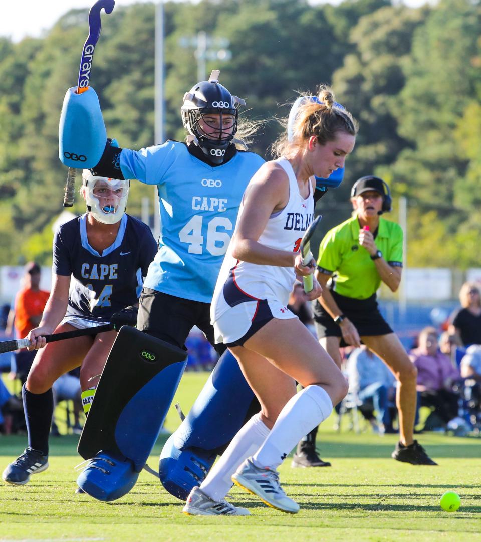 Cape Henlopen's Mackinzie Brown (14) and goalkeeper Morgan Newcomb defend as Delmar's Laura Rogers tries to add to the lead in the second half of the Wildcats' 2-1 win at Delmar High School, Thursday, Oct. 6, 2022.