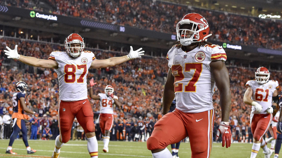 Kansas City Chiefs running back Kareem Hunt runs into the end zone for a fourth quarter touchdown as tight end Travis Kelce celebrates during Monday's football game against the Denver Broncos on Oct. 1, 2018 at Mile High Stadium in Denver. The Chiefs won 27-23. (John Sleezer/Kansas City Star/TNS via Getty Images)