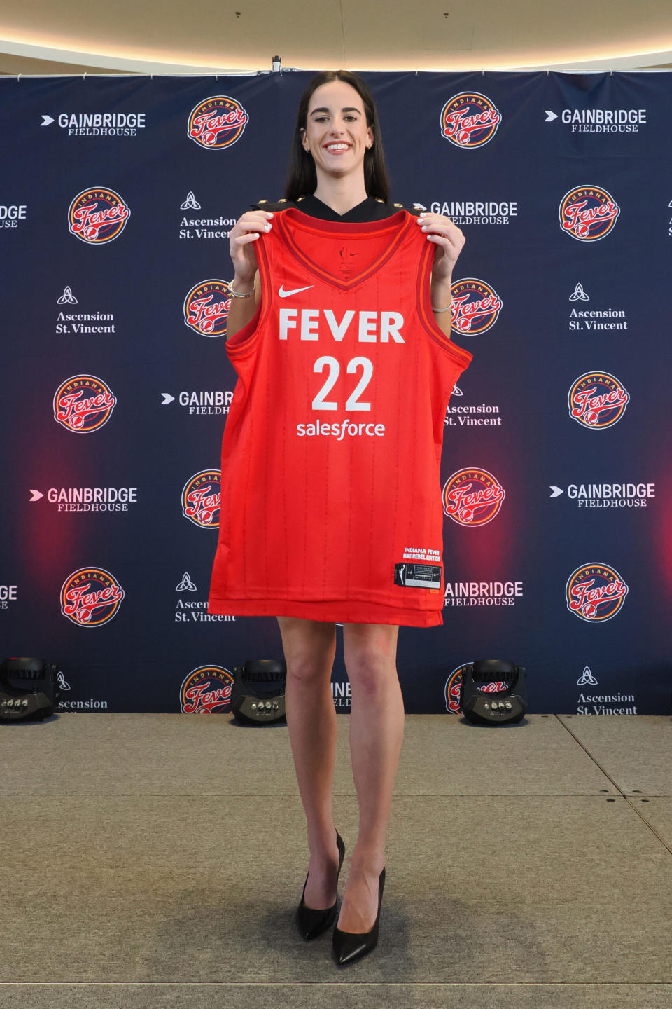 INDIANAPOLIS, IN – APRIL 17: Caitlin Clark #22 of the Indiana Fever poses for a photo during her introductory press conference on April 17, 2024 at Gainbridge Fieldhouse in Indianapolis, <a class="link " href="https://sports.yahoo.com/wnba/teams/indiana/" data-i13n="sec:content-canvas;subsec:anchor_text;elm:context_link" data-ylk="slk:Indiana;sec:content-canvas;subsec:anchor_text;elm:context_link;itc:0">Indiana</a>. NOTE TO USER: User expressly acknowledges and agrees that, by downloading and or using this Photograph, user is consenting to the terms and conditions of the Getty Images License Agreement. Mandatory Copyright Notice: Copyright 2024 NBAE (Photo by Ron Hoskins/NBAE via Getty Images)
