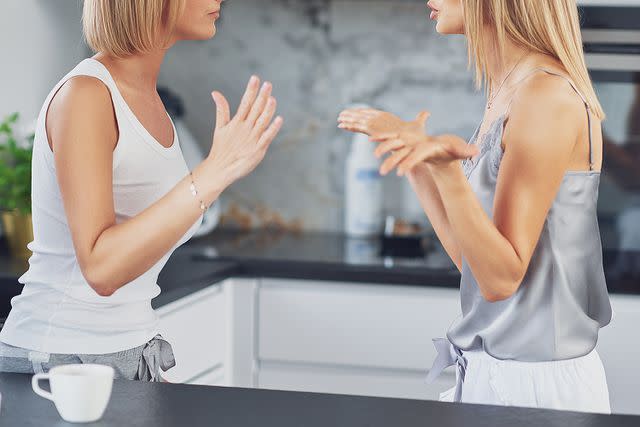 <p>Getty</p> Women fighting in kitchen