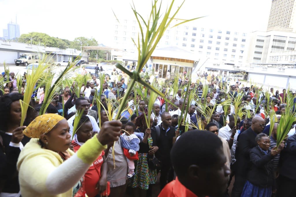 Christian faithful march carrying green Palm branches to commemorate Palm Sunday, which marks the entry of Jesus Christ into Jerusalem, in the streets of Nairobi, Kenya, Sunday, April 2, 2023. (AP Photo, File)