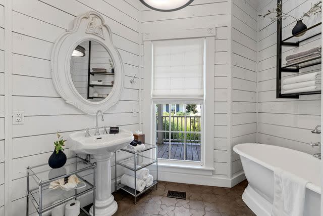 <p>Chase Tucker</p> A bathroom inside Chip and Joanna Gaines' Magnolia House