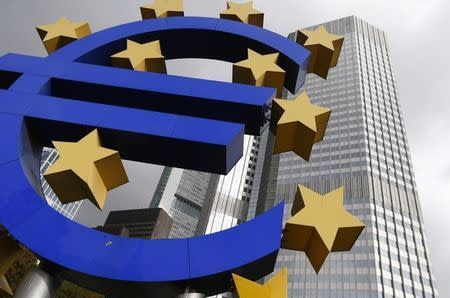 A euro logo sculpture stands in front the headquarters of the European Central Bank (ECB) in Frankfurt October 26, 2014. REUTERS/Ralph Orlowski