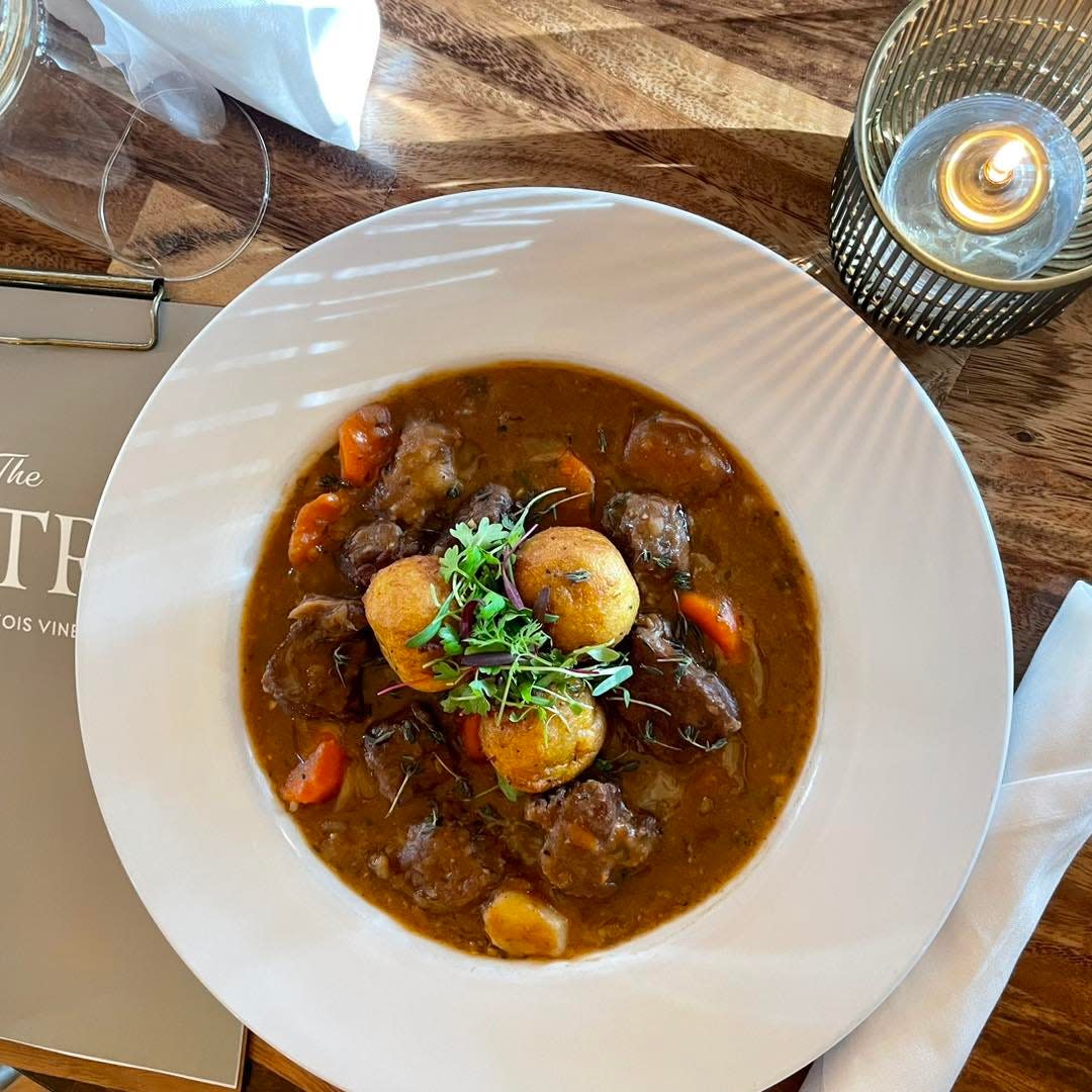 The Bistro's beef stew with corn fritters