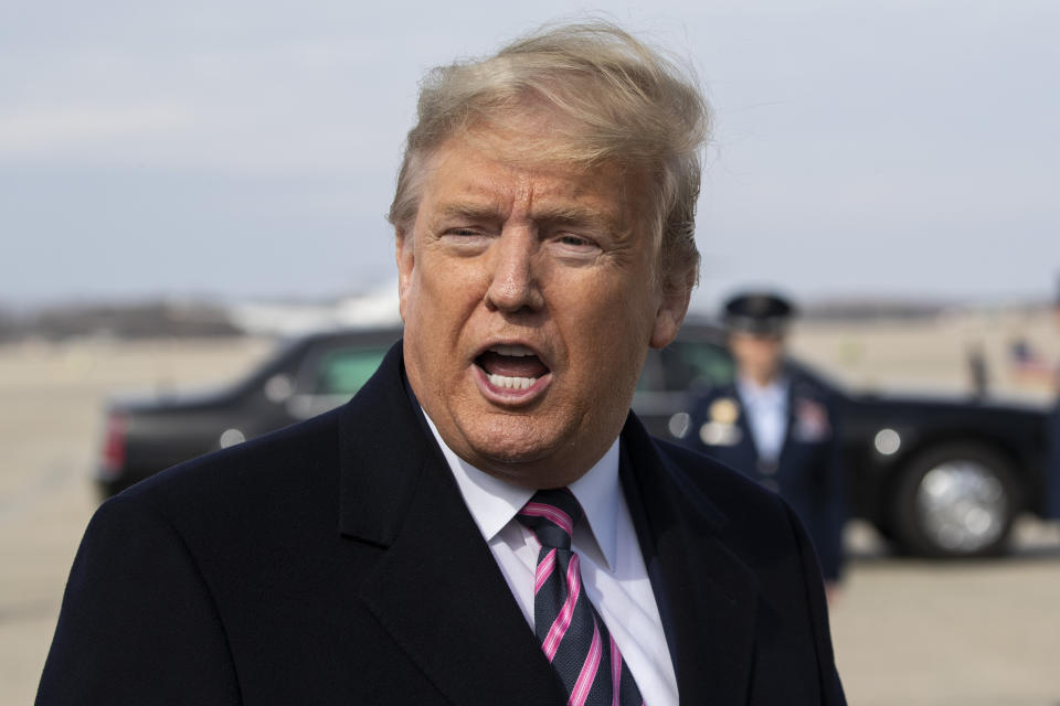 President Donald Trump speaks with reporters as he boards Air Force One as he departs Tuesday, Feb. 18, 2020, at Andrews Air Force Base, Md.(AP Photo/Alex Brandon)