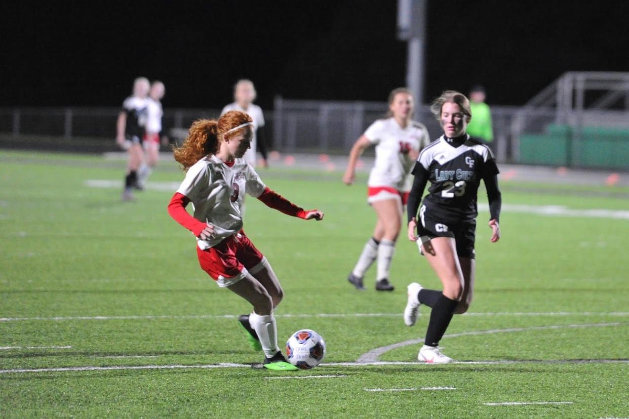 Marion Harding's Taylor Iden dribbles the ball during a girls soccer match against Clear Fork last season.