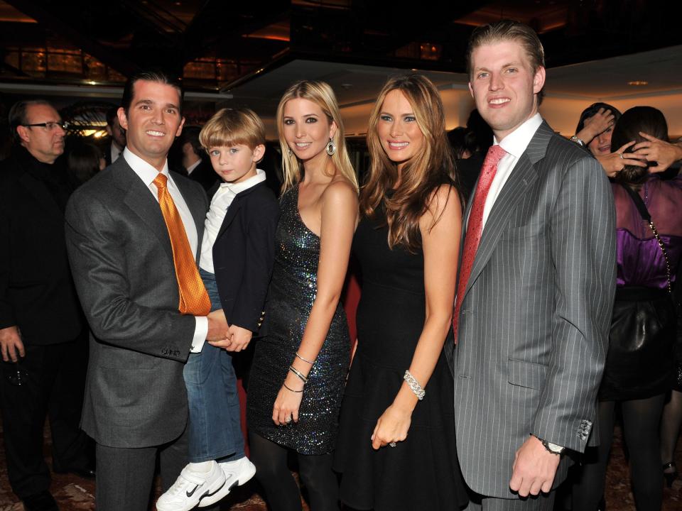 Don Jr., Barron Trump, Ivanka Trump, Melania Trump, and Eric Trump at Ivanka's book launch on October 2009.