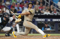 San Diego Padres' Juan Soto (22) follows a pop fly in the fifth inning of a baseball game against the Miami Marlins, Monday, Aug. 15, 2022, in Miami. (AP Photo/Marta Lavandier)