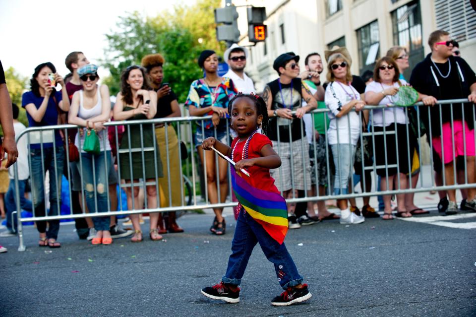 A little girl marches during the 2013 Capital Pride parade in Washington on June 8, 2013. AFP PHOTO/Nicholas KAMM