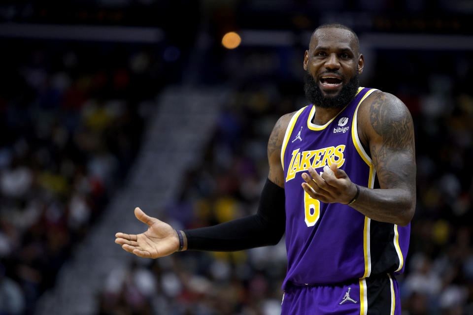 NEW ORLEANS, LOUISIANA - MARCH 27: LeBron James #6 of the Los Angeles Lakers reacts to a call during the fourth quarter of an NBA game against the New Orleans Pelicans at Smoothie King Center on March 27, 2022 in New Orleans, Louisiana. New Orleans Pelicans won the game 116 - 108. NOTE TO USER: User expressly acknowledges and agrees that, by downloading and or using this photograph, User is consenting to the terms and conditions of the Getty Images License Agreement. (Photo by Sean Gardner/Getty Images)