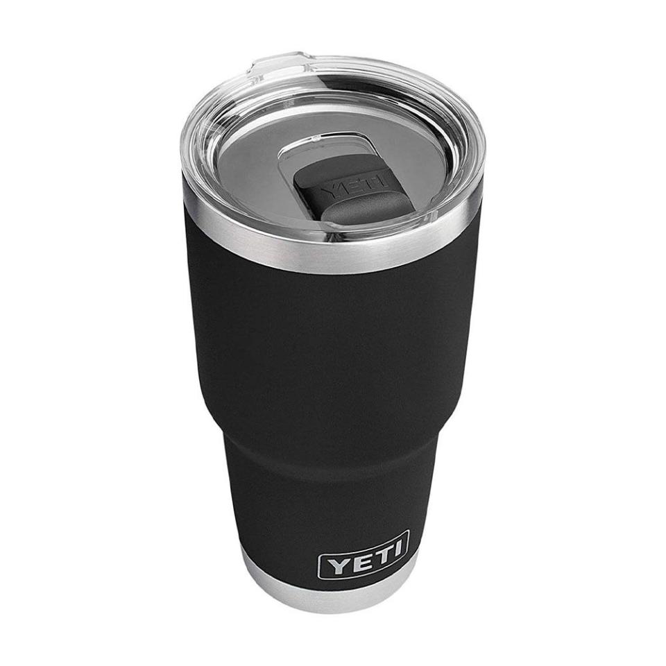 <p><a href="https://www.amazon.com/YETI-Rambler-Stainless-Insulated-MagSlider/dp/B073WJRJZZ/ref=sr_1_2_sspa?crid=2DMIWCHHB9ZMP&keywords=yeti%2Btumbler&qid=1680616189&sprefix=yeti%2Btumble%2Caps%2C82&sr=8-2-spons&smid=A3VZHMRV3J141P&spLa=ZW5jcnlwdGVkUXVhbGlmaWVyPUEyMzFUMVlRM1dEMVdOJmVuY3J5cHRlZElkPUEwMjE5MDM3MjdIUjJBSkZPNjY3UiZlbmNyeXB0ZWRBZElkPUEwMDAwMDQzM0gxTURMWkdGOUM2QSZ3aWRnZXROYW1lPXNwX2F0ZiZhY3Rpb249Y2xpY2tSZWRpcmVjdCZkb05vdExvZ0NsaWNrPXRydWU&th=1&psc=1&tag=syn-yahoo-20&ascsubtag=%5Bartid%7C10054.g.20684150%5Bsrc%7Cyahoo-us" rel="nofollow noopener" target="_blank" data-ylk="slk:Shop Now;elm:context_link;itc:0;sec:content-canvas" class="link ">Shop Now</a></p><p>Rambler 30 oz Tumbler</p><p>amazon.com</p><p>$38.00</p>