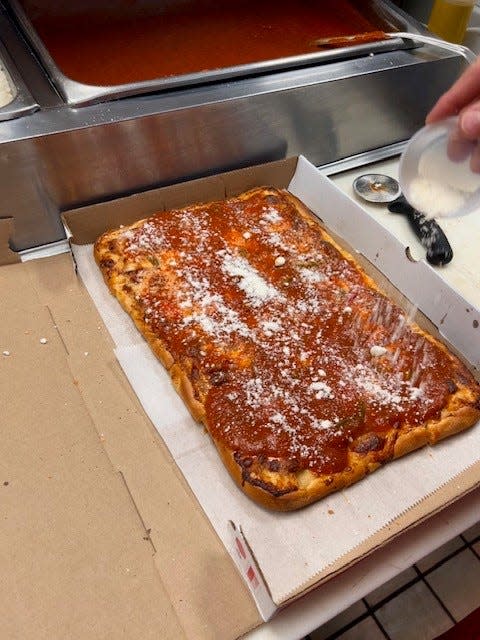 Tomato pie is an iconic Utica dish brought over by Italian immigrants. This one is from O'Scugnizzo Pizzeria, which was opened by one such immigrant 110 years ago.