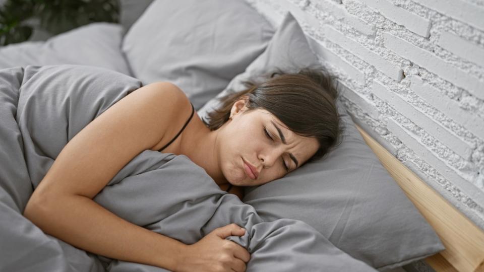 Sleeping on your side is a much healthier option than sleeping on your back. Krakenimages.com – stock.adobe.com