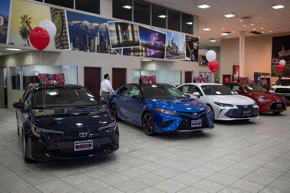 Toyota sedans are displayed in a showroom at Puente Hills Toyota Thursday, Feb. 14, 2019, in Industry, Calif. If 25 percent tariffs are fully assessed against imported parts and vehicles, and they include Canada and Mexico, the price of imported vehicles would rise more than 17 percent, or around $5,000 each, according to forecasts from IHS Markit. â€œI think it would be harmful to the whole economy,â€ said Howard Hakes, president of Hitchcock Automotive, which has three Toyota showrooms in metro Los Angeles. (AP Photo/Jae C. Hong)