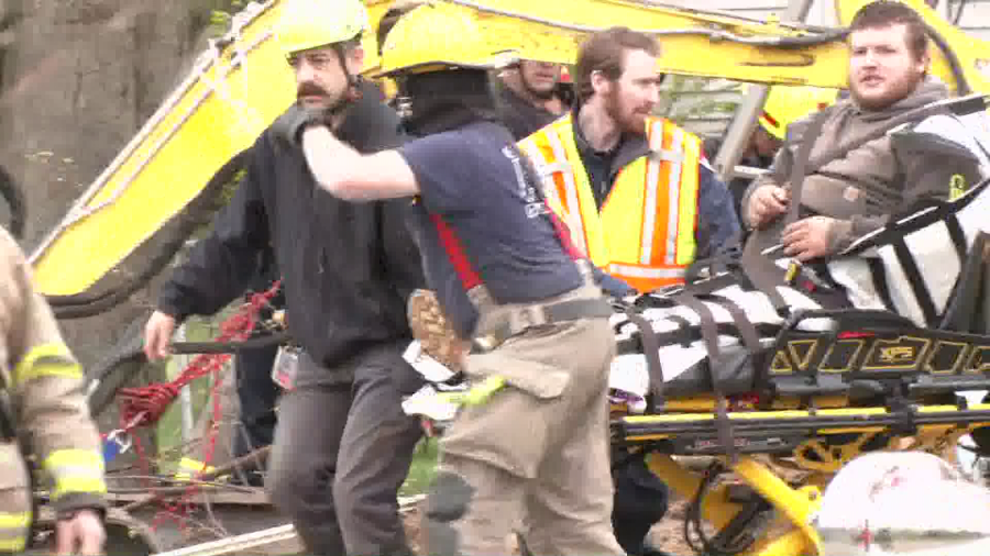 Emergency responders save man stuck in well hole in Onondaga. (WLNS)