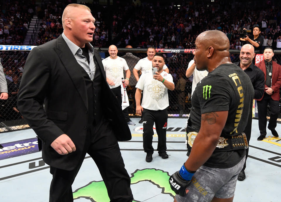 LAS VEGAS, NV - JULY 07:  Brock Lesnar confronts Daniel Cormier after his UFC heavyweight championship fight during the UFC 226 event inside T-Mobile Arena on July 7, 2018 in Las Vegas, Nevada.  (Photo by Josh Hedges/Zuffa LLC/Zuffa LLC via Getty Images)