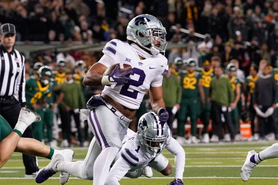 Kansas State safety Kobe Savage looks upfield after intercepting a pass Saturday against Baylor. K-State coach Chris Klieman said Tuesday that Savage suffered a season-ending injury against the Bears.