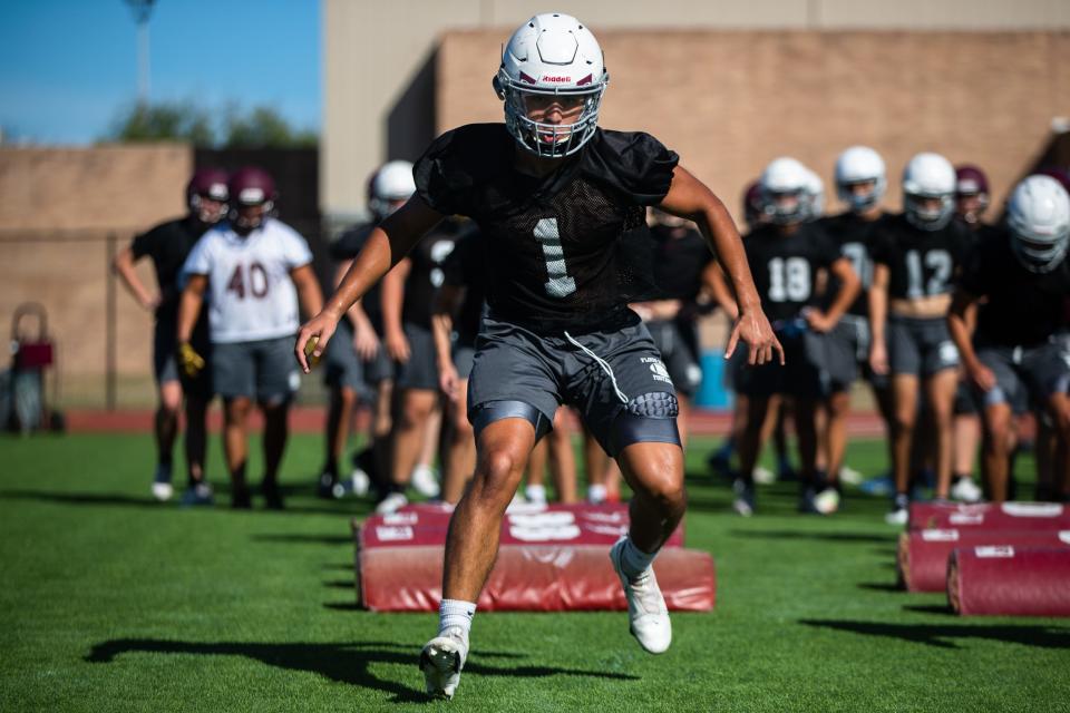 Cristian Arriaga does a drill at a Flour Bluff football practice on Wednesday, August 10, 2022 at Hornet Stadium in Corpus Christi, Texas.