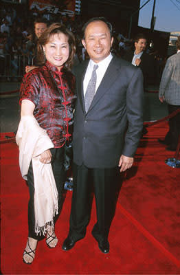 John Woo with his wife at The Chinese Theater premiere of Paramount's Mission Impossible 2