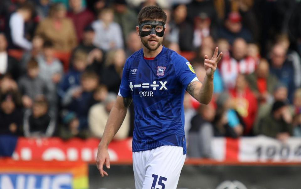 East Anglian Daily Times: Cameron Burgess wearing a mask after returning from his injury.